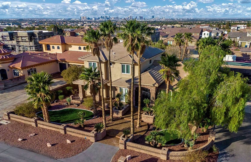 Aerial photo of a property listing with views of the Las Vegas strip in the background.