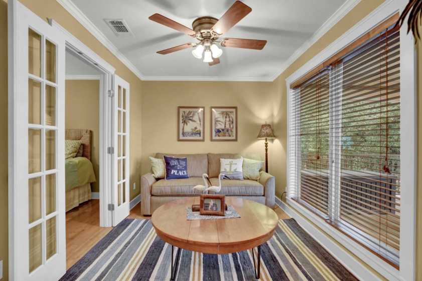 bonus room with table and view of patio